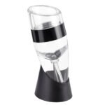 Clear wine aerator with black accents and base, isolated on white