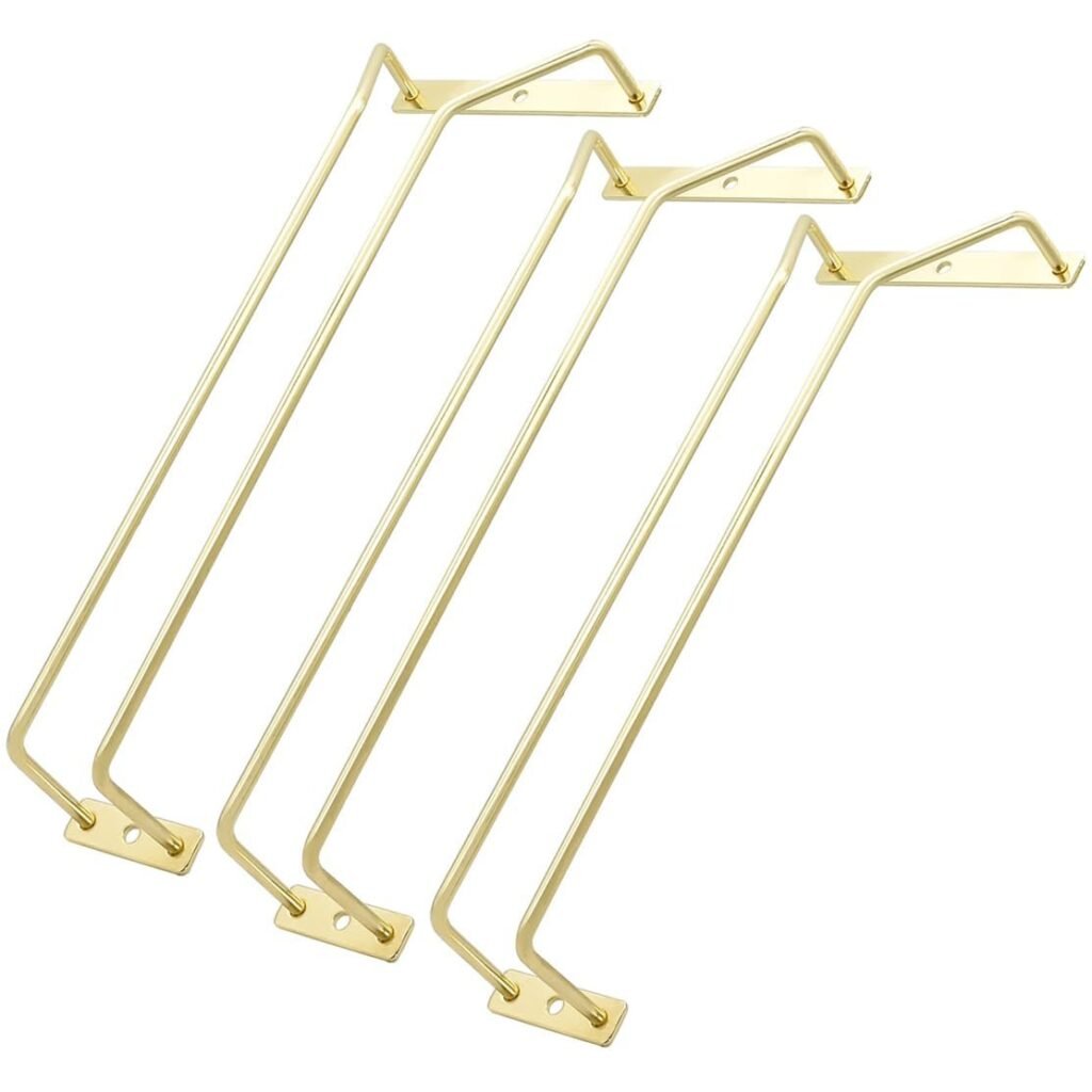 Four gold-colored metal stemware racks, angled and mounted on a white background