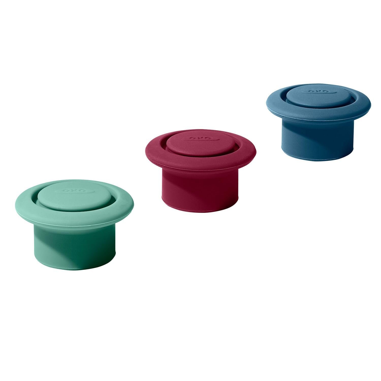 Three colorful OXO wine stoppers in teal, red, and blue
