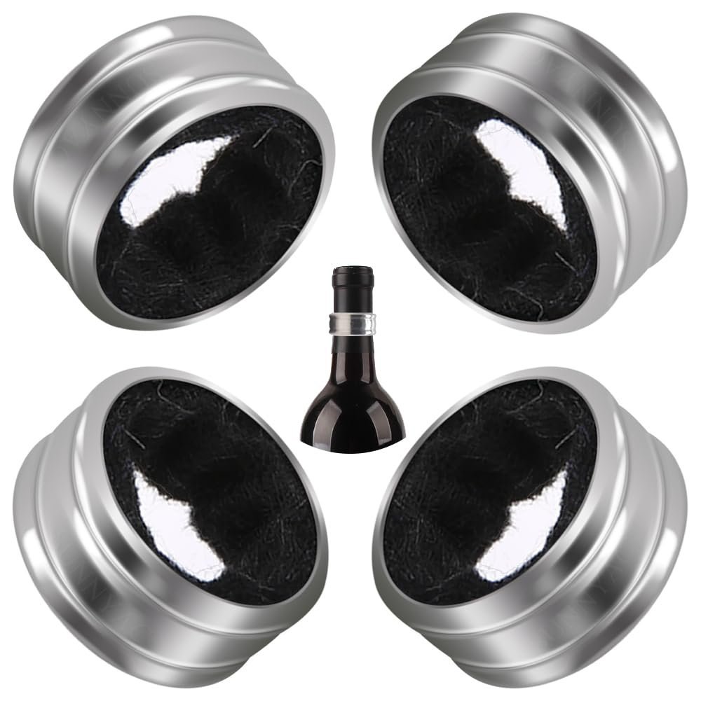 Four silver containers with black material and a wine bottle
