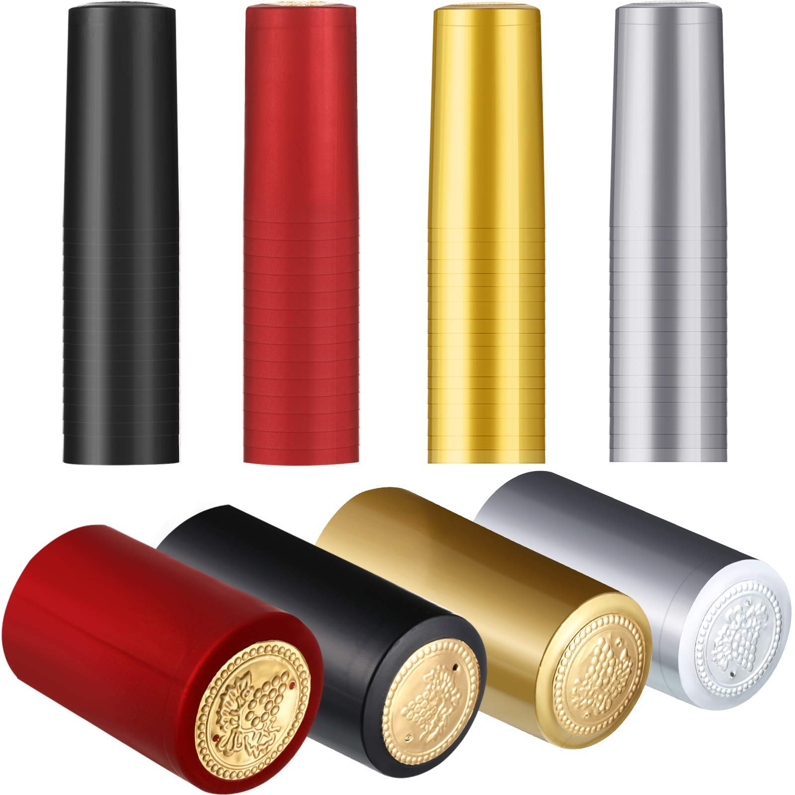 Four colored wine bottle capsules, two upright and two lying down, with grape emblems