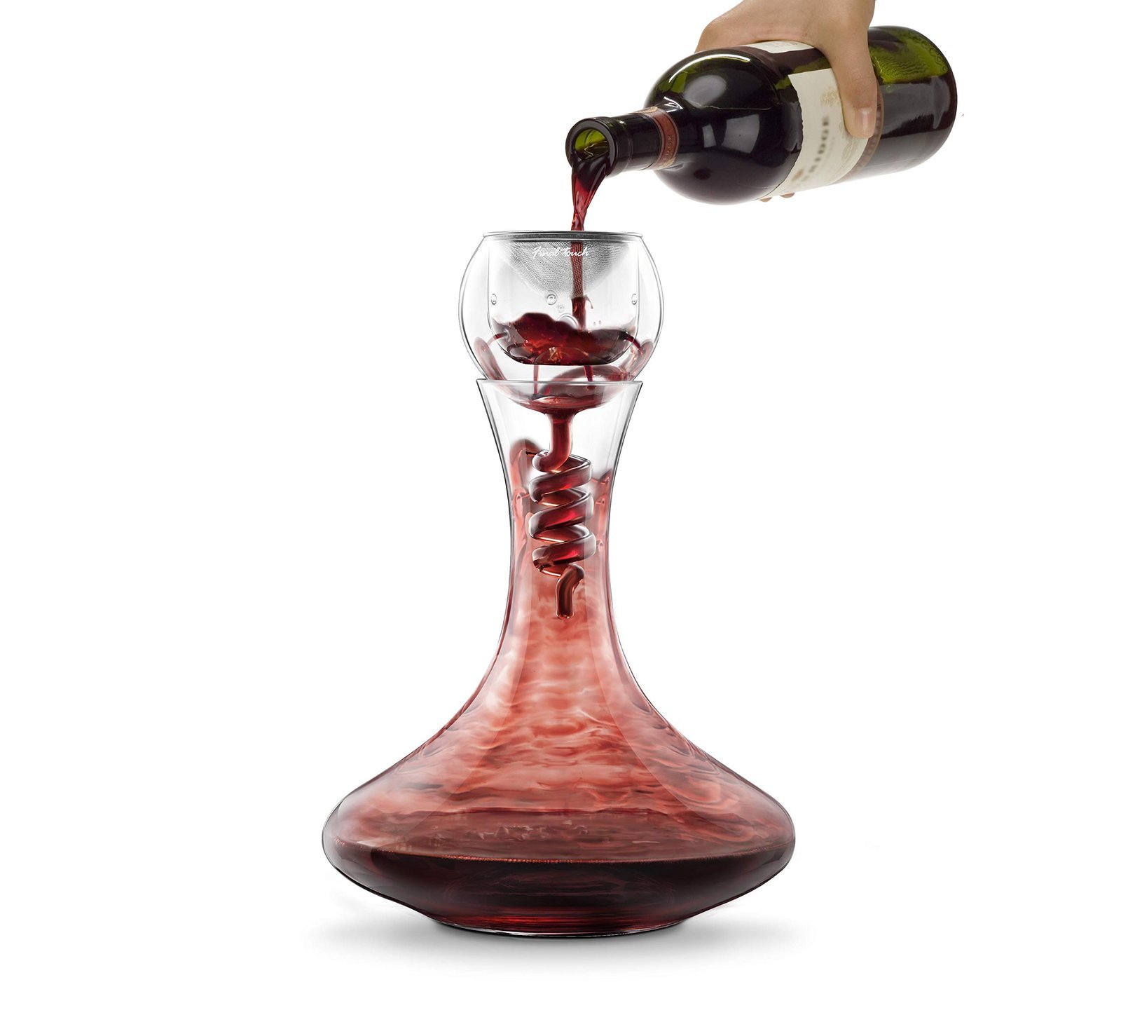 Red wine being poured into a decanter with a spiral design