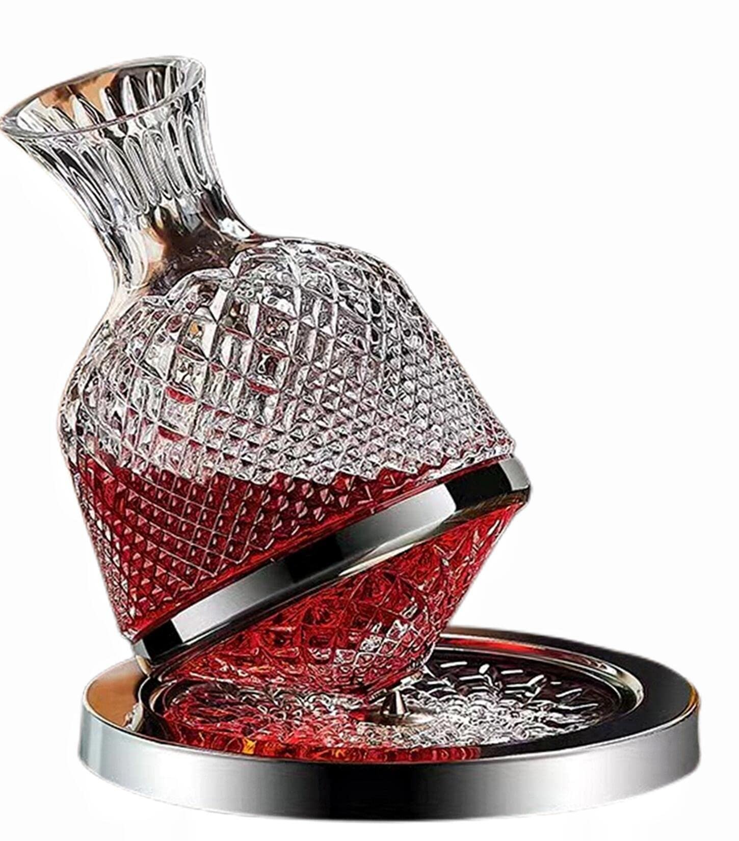 Crystal decanter filled with red liquid, resting on a silver base